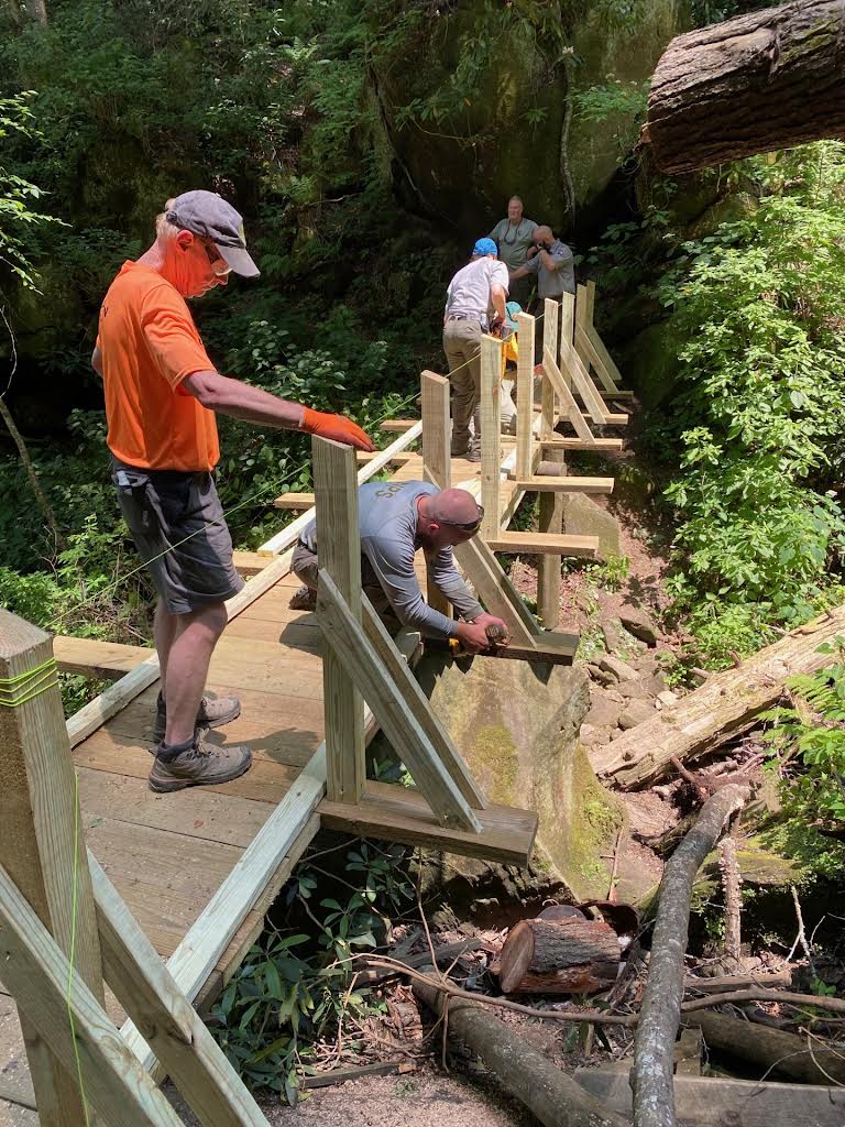Volunteer bridge builders